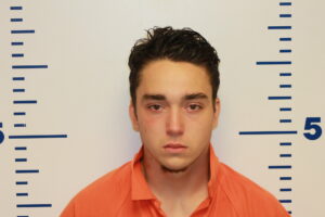 Waylon Peltier, 18, was arrested in the connection of the two armed robberies.