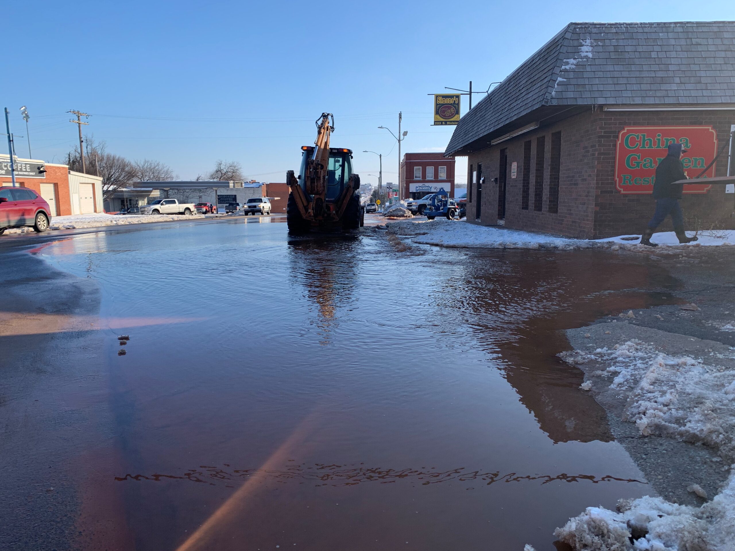 Video Water line breaks, sending water down Division St. Guthrie