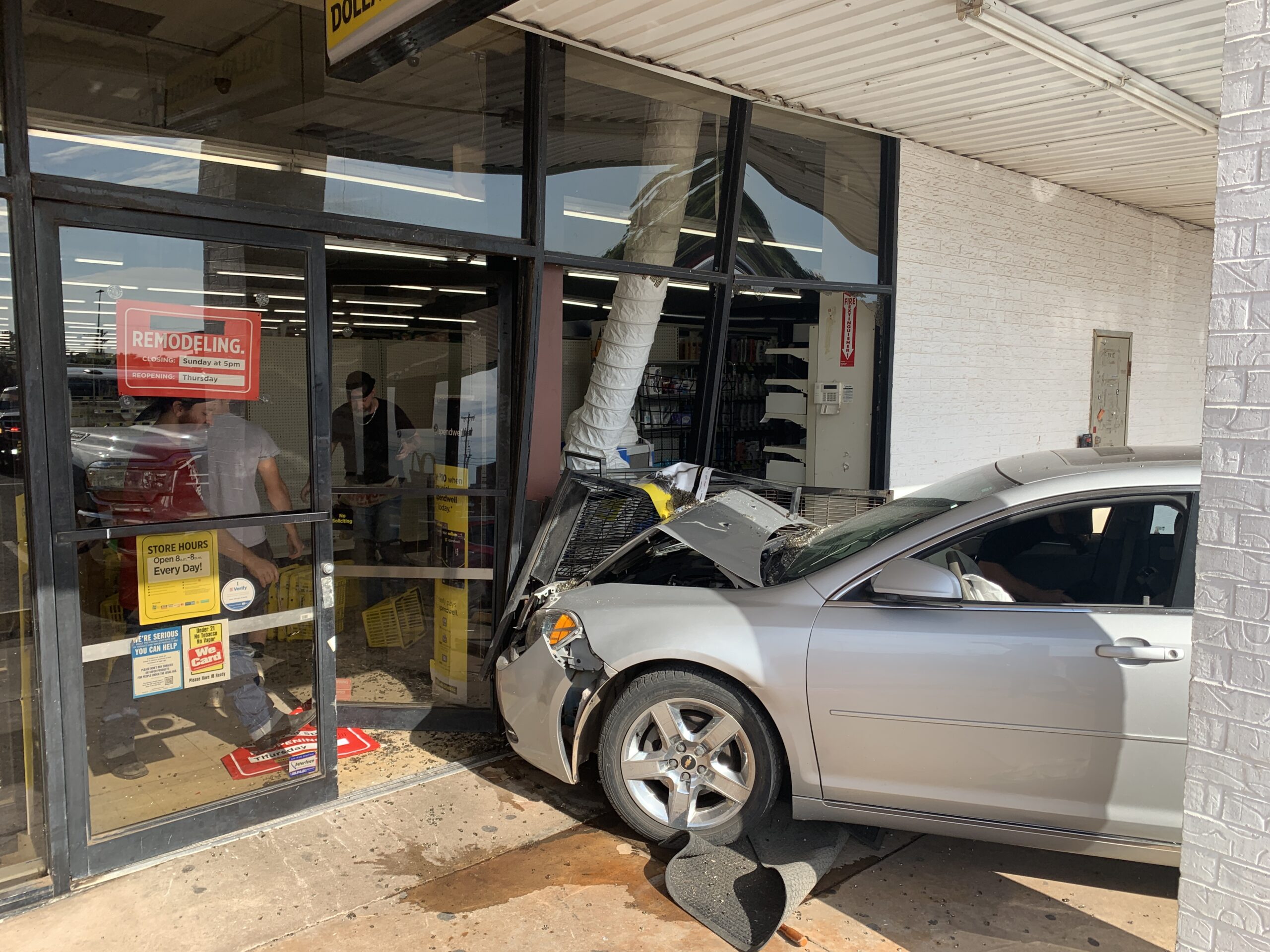 Vehicle smashes into barrier, two cars and store front – Guthrie News Page
